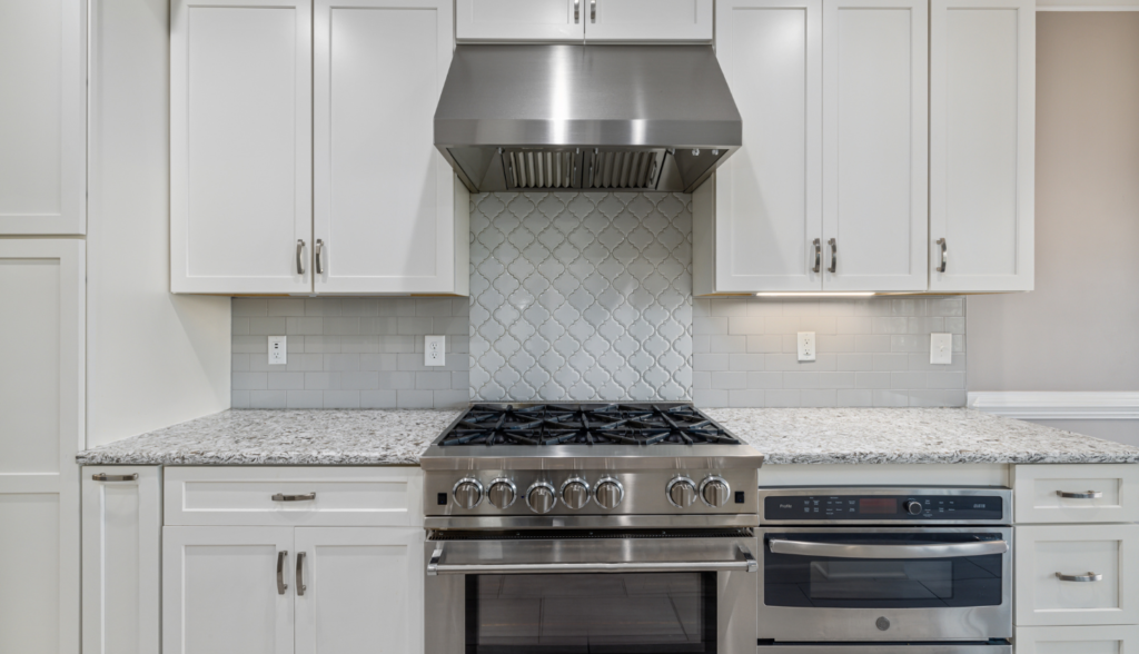 a stailess steel stove in a kitchen